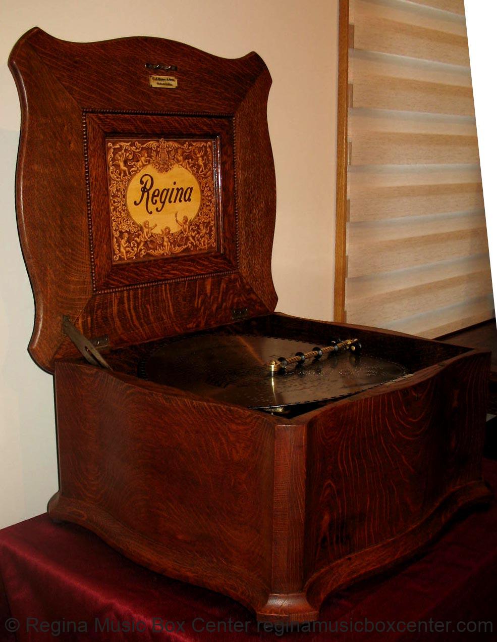 Regina Music Box Center REGINA 151/2\" STYLE 50 OAK SERPENTINE DISC